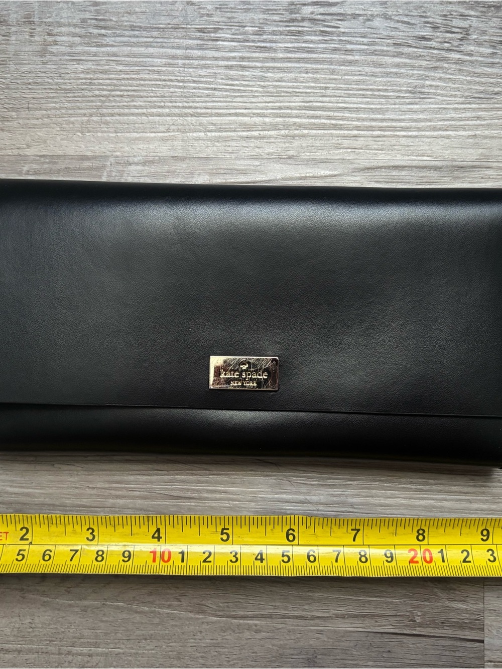 kate spade black leather envelope clutch with gold plaque
